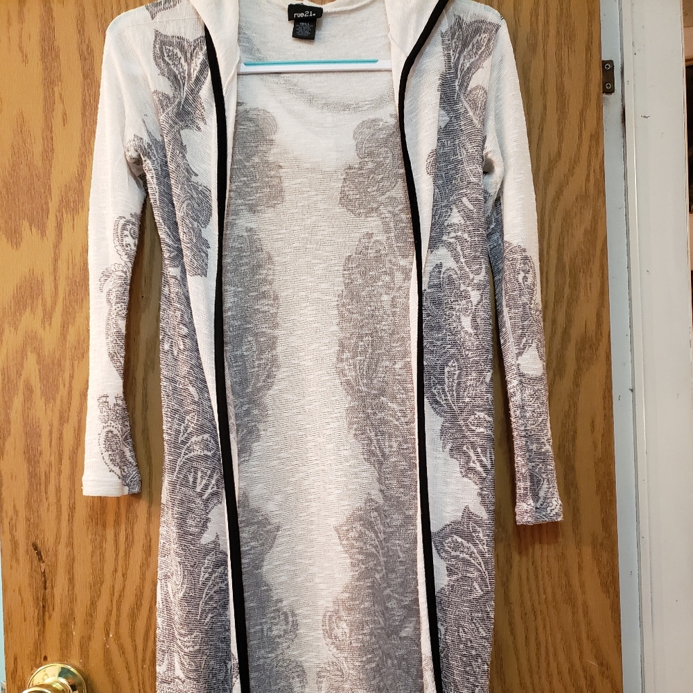 Beautiful white,black and gray hoodie duster. Great shape. So cute. Lightweight.